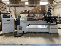 Máy tiện gỗ chà nhám CNC Woodmaster tự động nạp phôi 6303